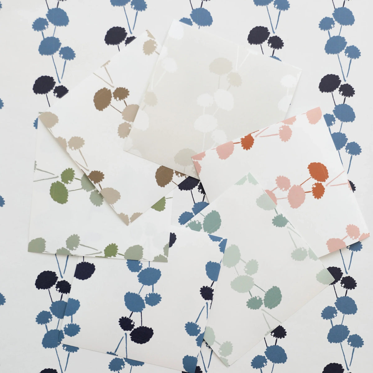 Luxury botanical and floral wallpaper featuring an elegant linear dahlia vine pattern inspired by English gardens, designed for modern traditional interiors, powder rooms, bedrooms, dining spaces, and layered luxury homes. Sustainably printed in England by Truett Designs.