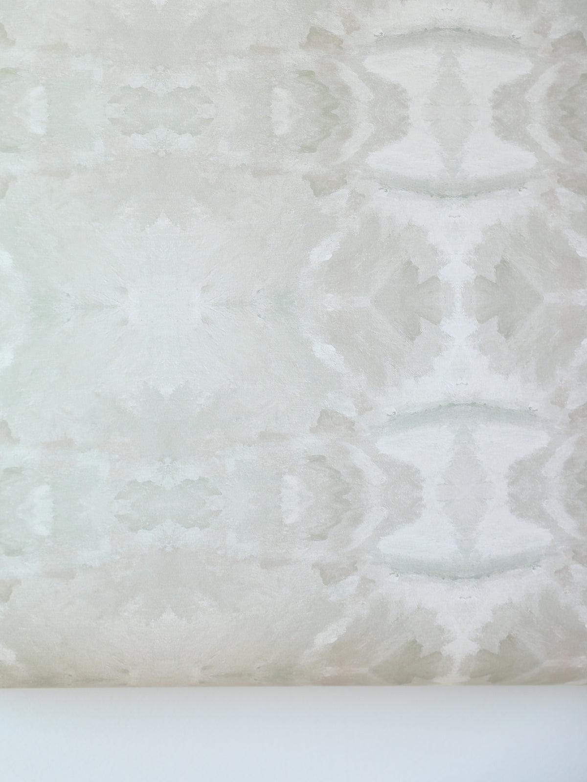 luxury abstract neutral wallpaper in soft putty tones with layered organic movement inspired by live oak trees, designed for modern traditional interiors, luxury bedrooms, powder rooms, dining spaces, and collected contemporary homes. Sustainably printed in England by Truett Designs.