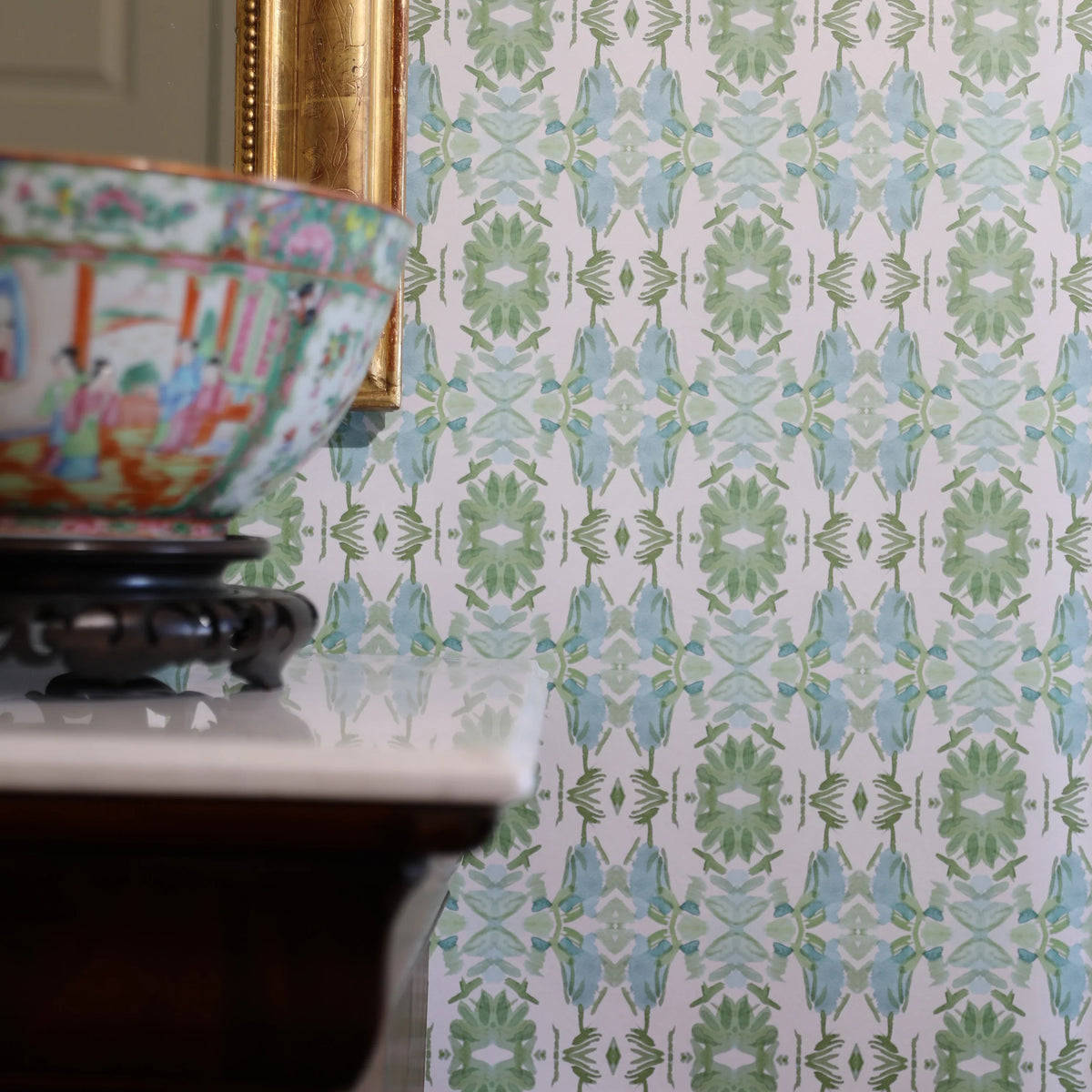 Luxury botanical wallpaper featuring an artistic wildflower-inspired pattern in sage green and soft blue, designed for modern traditional interiors, powder rooms, bedrooms, dining rooms, and collected homes.