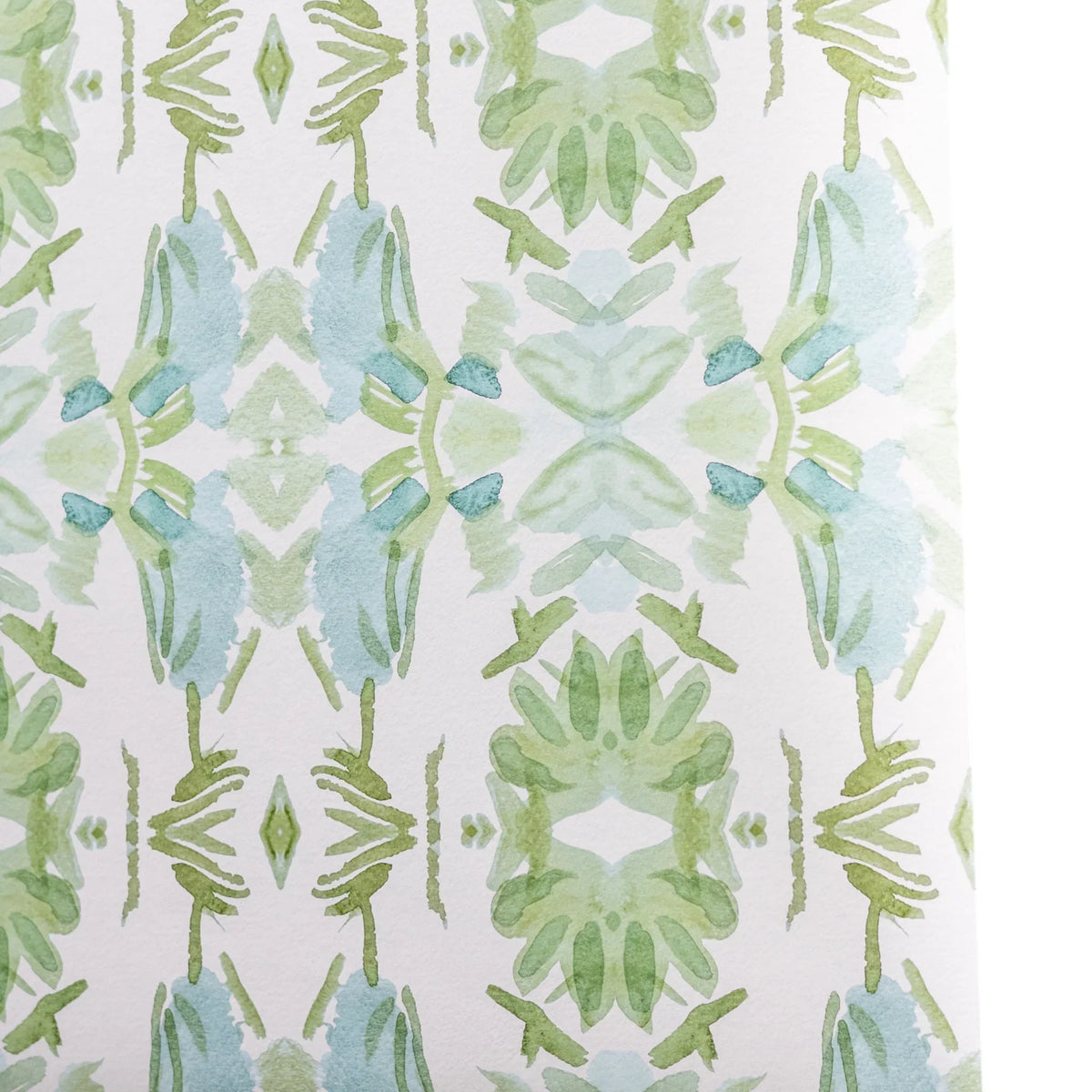 Luxury botanical wallpaper featuring an artistic wildflower-inspired pattern in sage green and soft blue, designed for modern traditional interiors, powder rooms, bedrooms, dining rooms, and collected homes.