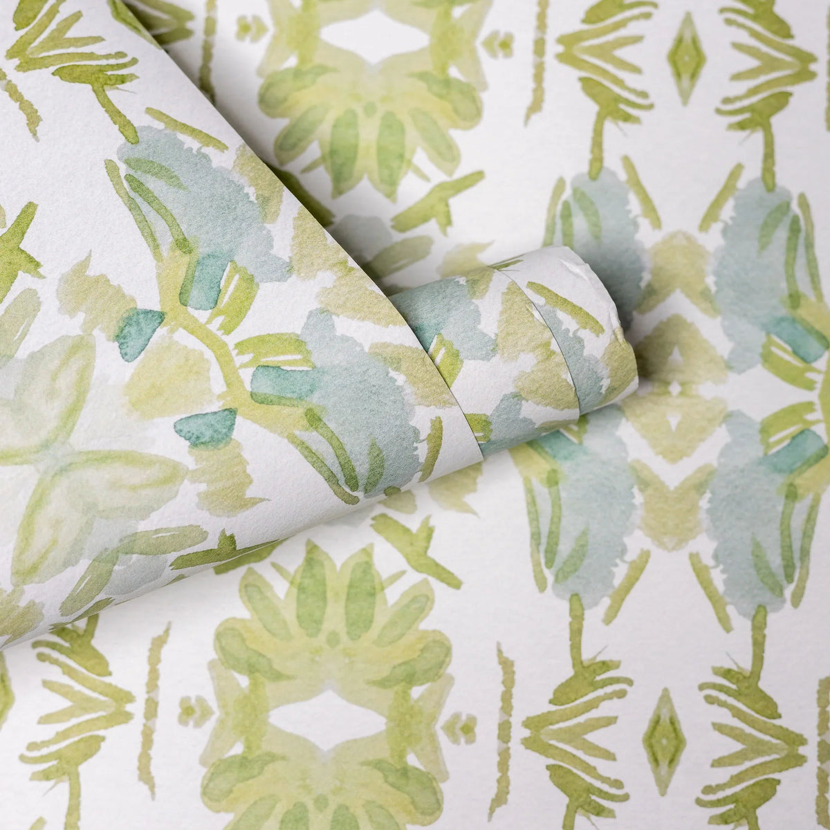 Wildflowers I White & Apple Green luxury wallpaper featuring an abstract floral pattern on a soft white ground with fresh apple green tones, sustainably printed in England for luxury homes, designer-curated interiors, powder rooms, bedrooms, and thoughtfully layered living spaces.